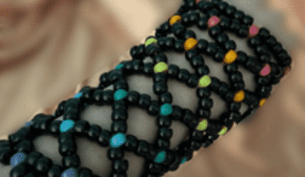 a cool kandi fishnet arm warmer